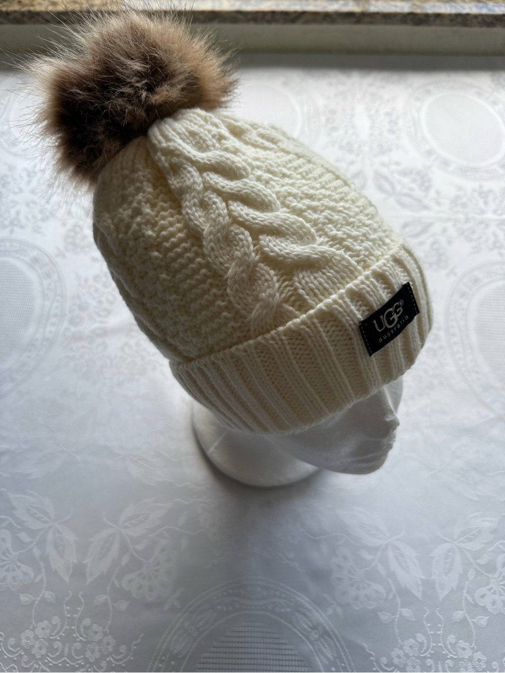 UGG Fleece Lining Cream Cable Knit Link Beanie with Brown Faux-Fur Pom Pom